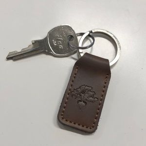 LOVE HEALS LEATHER KEYCHAIN